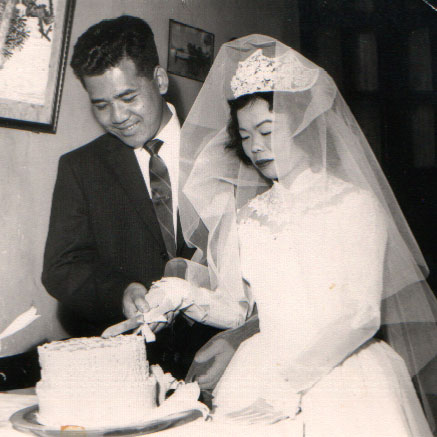 Jack and Nancy Chan cut the cake on their wedding day