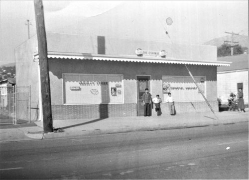 Gary, Shuji, and Kenny in front of store