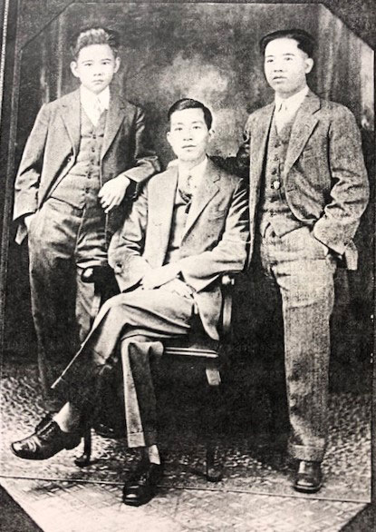 Hong Y. Wong with brother-in-law Finley Yee and Ung Hi Lee