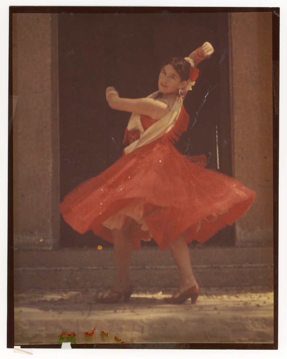 Kathy Cota, aged 16, dancing during Fiesta, 1957