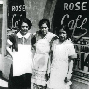 Maria Herrera Alvarez and two others in front of Rose Café
