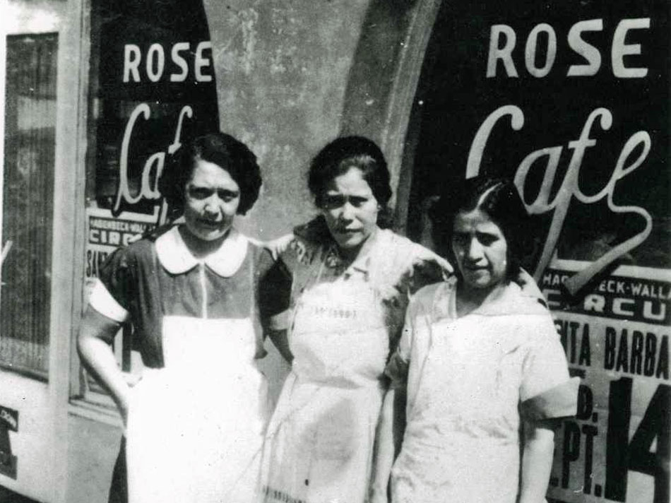 Three women in front of Rose Cafe